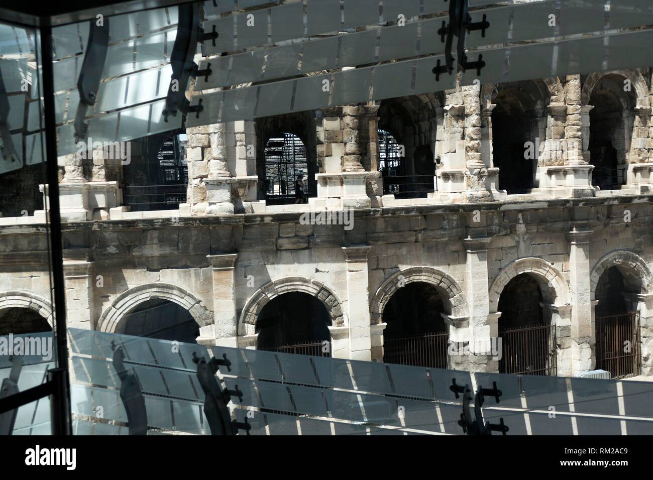 The segmented, geometric light reflectors on the Roman Museum facade
