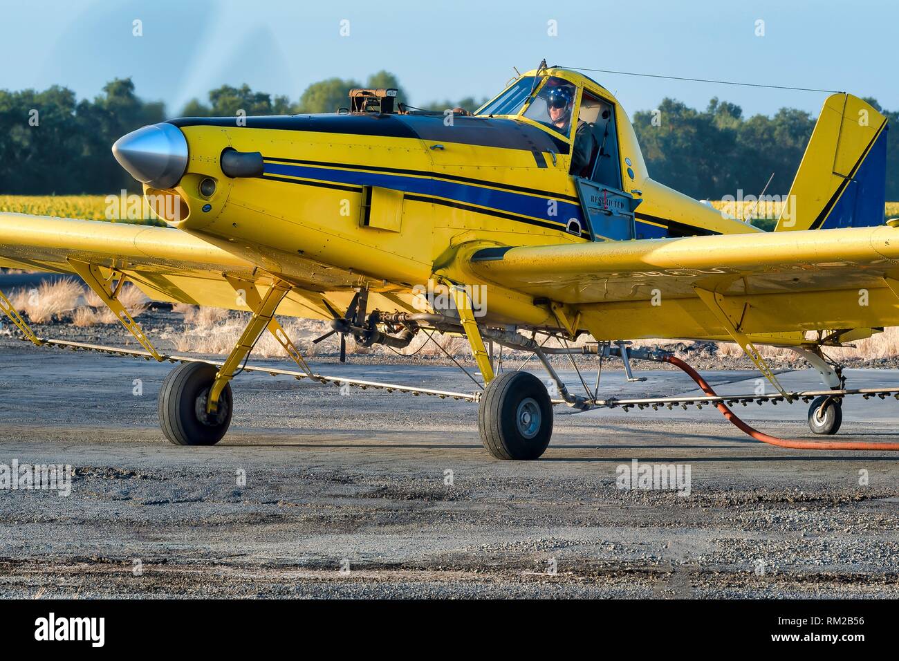Crop duster reloading in Yolo County, CA Stock Photo Alamy