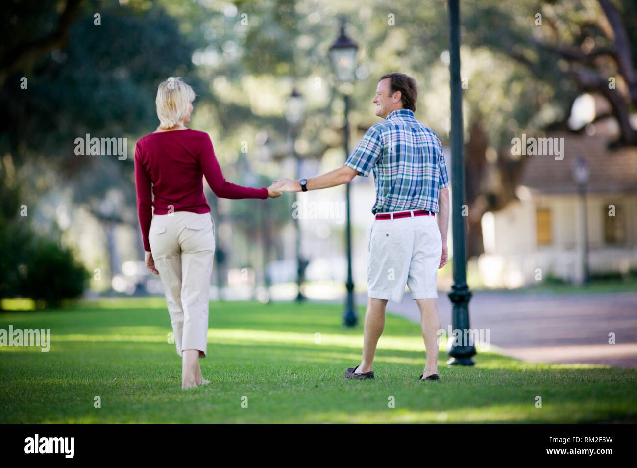 Romantic walk with a man and women hi-res stock photography and images ...