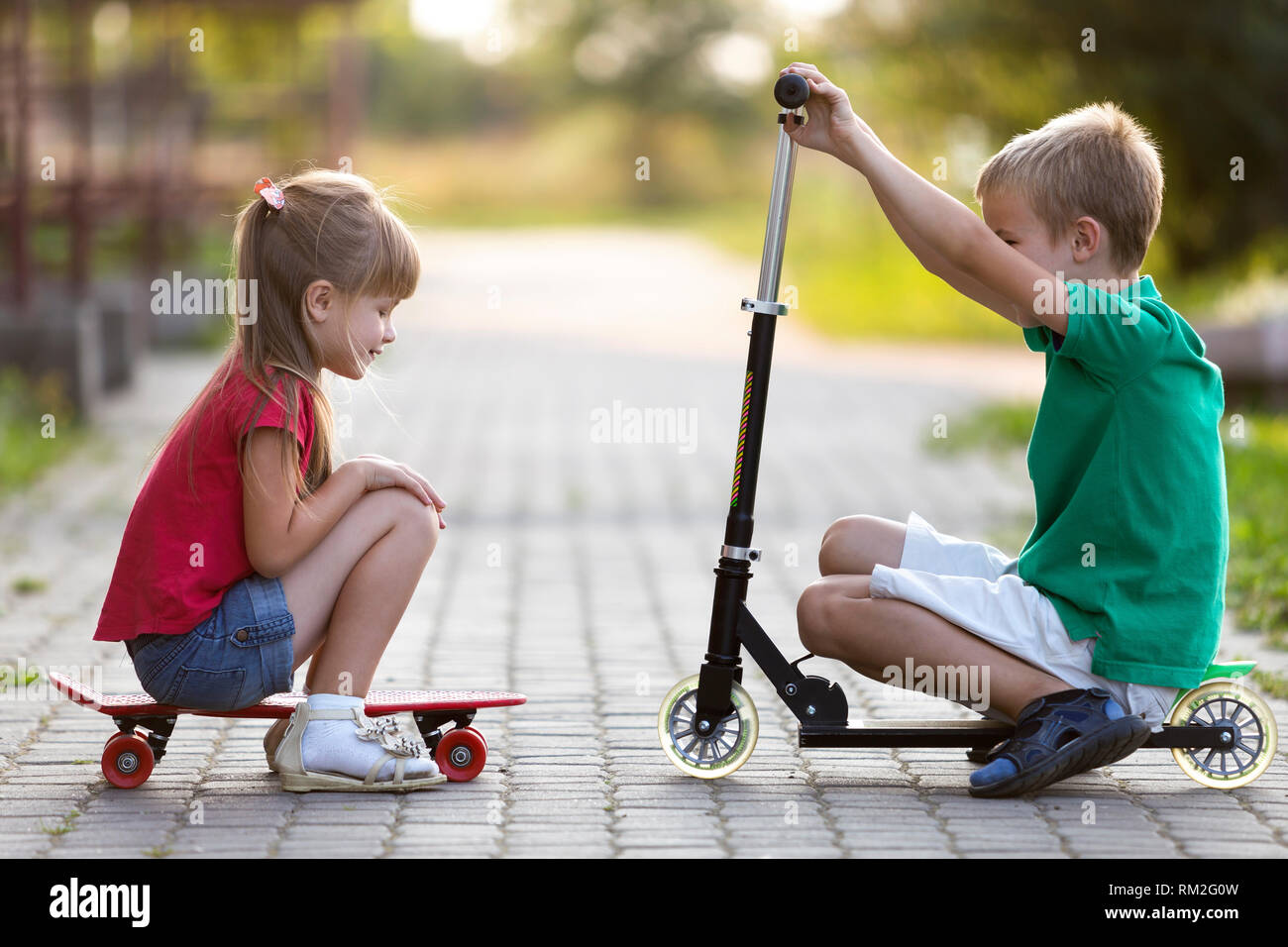 Two Cute Happy Funny Smiling Young Children Brother And Sister