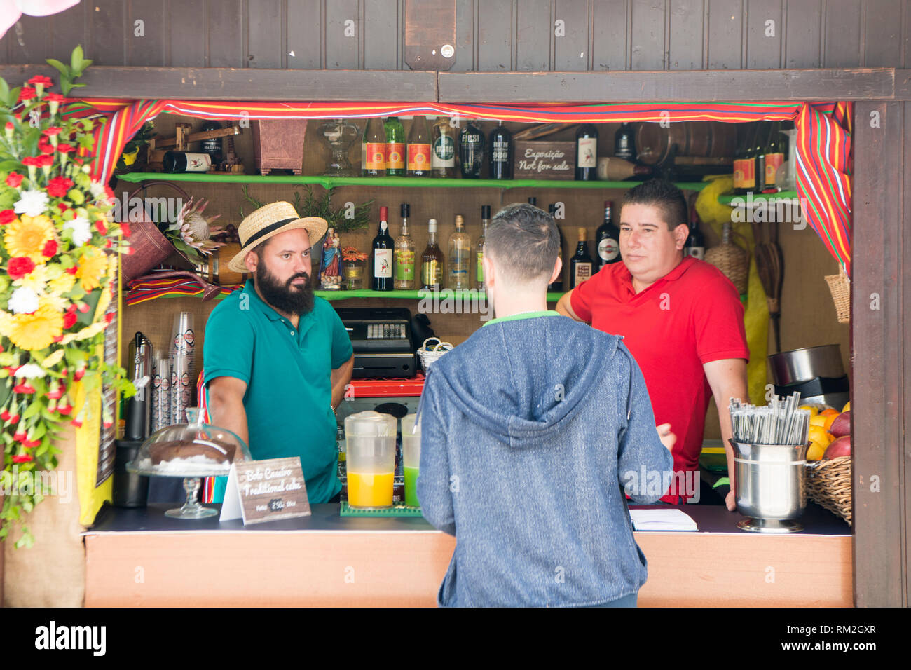 a shop with Madeira Wine and rum at the market street at the avenida