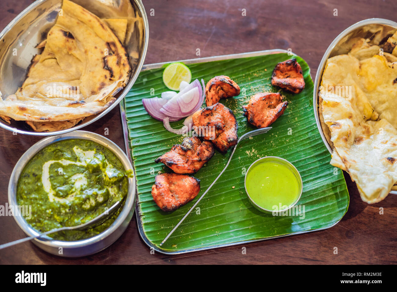 Assorted Indian Food On Dark Wooden Background Dishes And