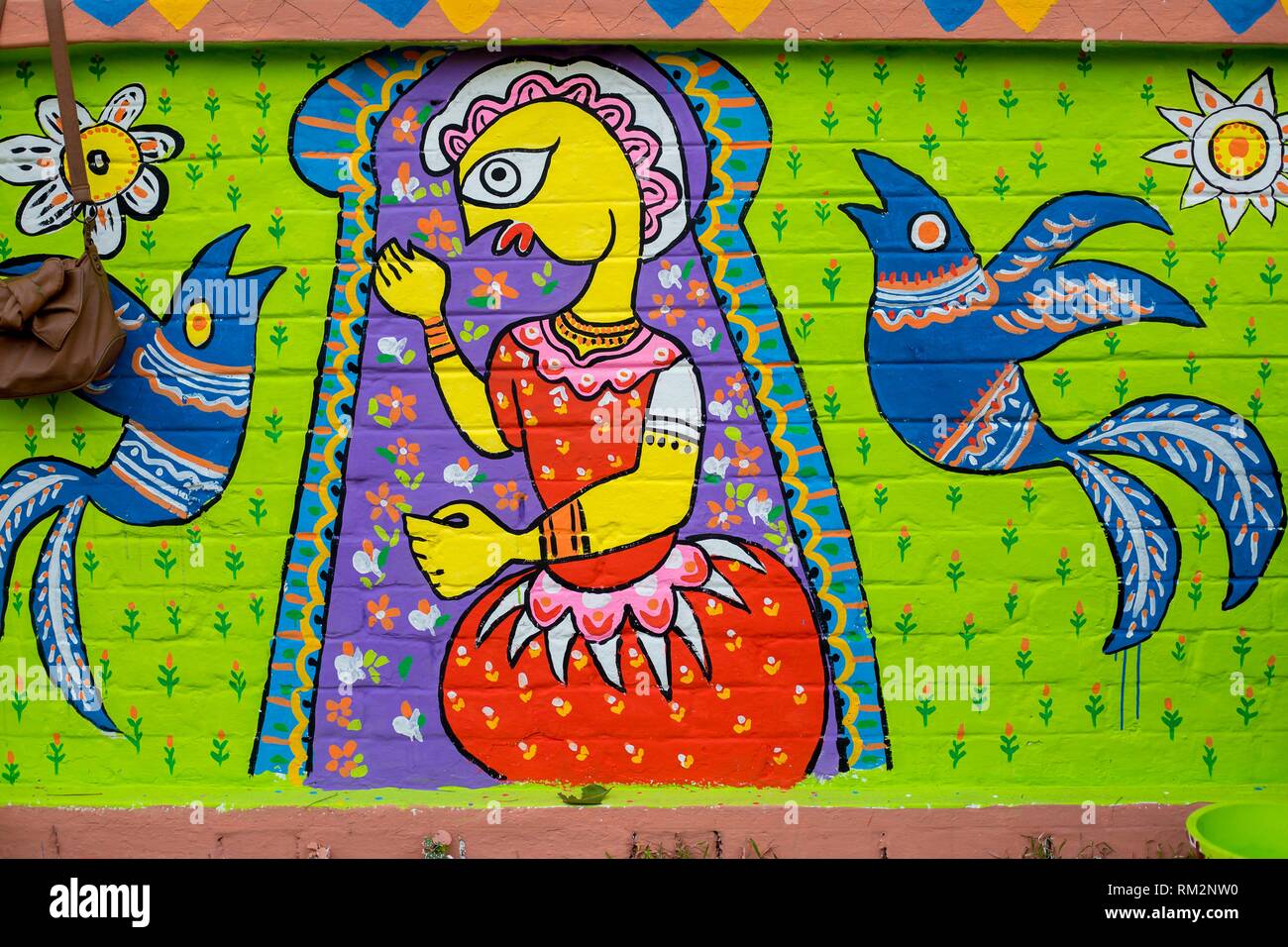 Bangla wall painting. Pahela Boishakh (the first day of the Bangla month)  can be followed back to its origins during the Mughal period when Emperor  Stock Photo - Alamy