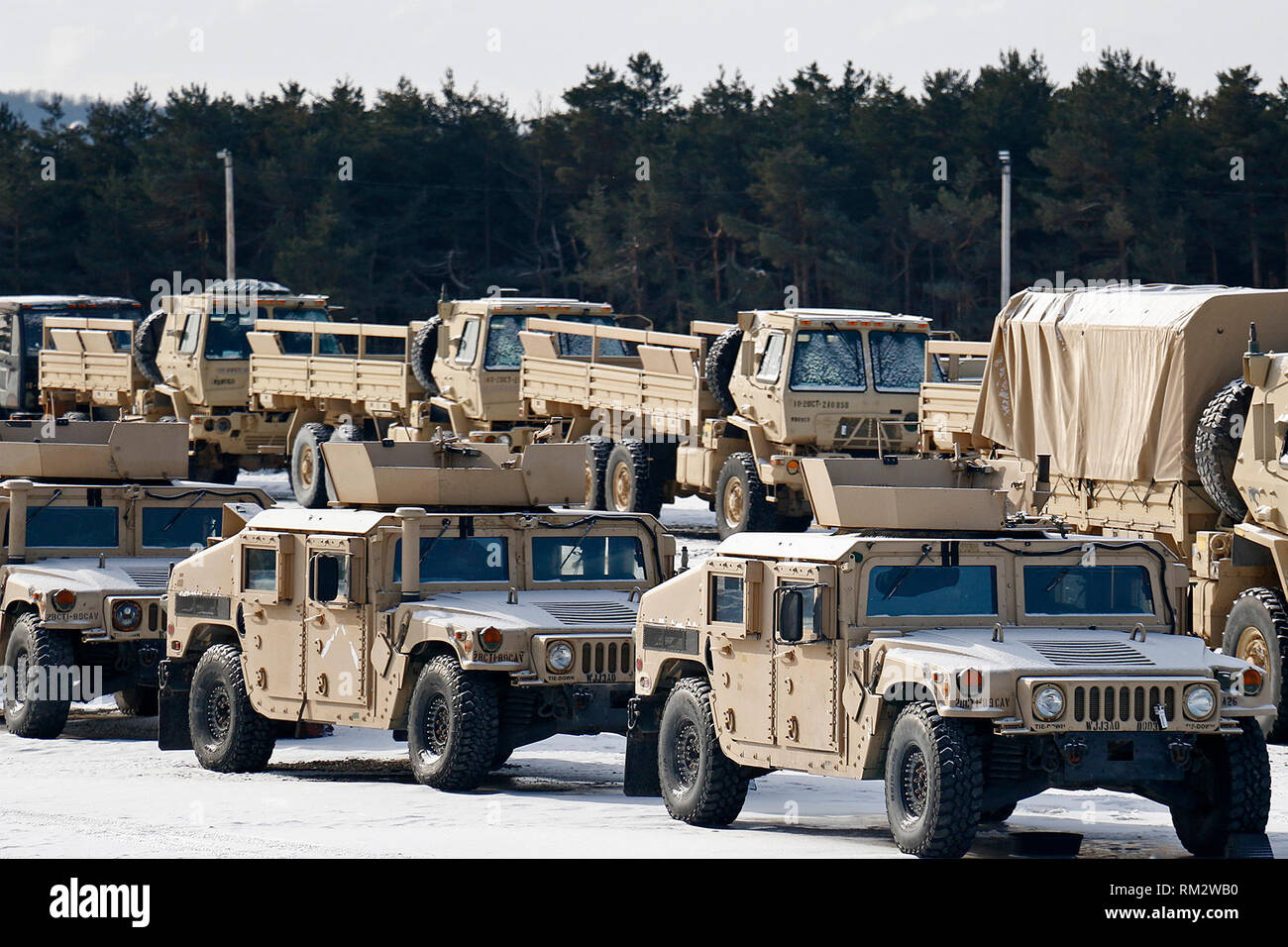 Soldiers of the 2nd Brigade Combat Team, 10th Mountain Division, load vehicles for transport to Fort Polk, Louisiana, as the brigade's rear element prepares for a series of training support missions for units across the division, February 11, 2019, at Fort Drum, New York. While half the brigade is deployed to Afghanistan and Kosovo as Task Force Courage, the remaining Commando Soldiers comprising Task Forces Honor and Hale will head to the Joint Readiness Training Center to support 10MTN readiness as a whole during a series of back-to-back series of training exercises.(U.S. Army photo by Staff Stock Photo