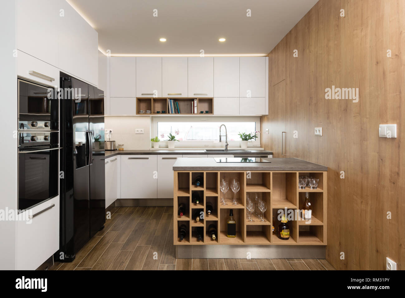 Interior of modern kitchen with built-in appliances Stock Photo - Alamy