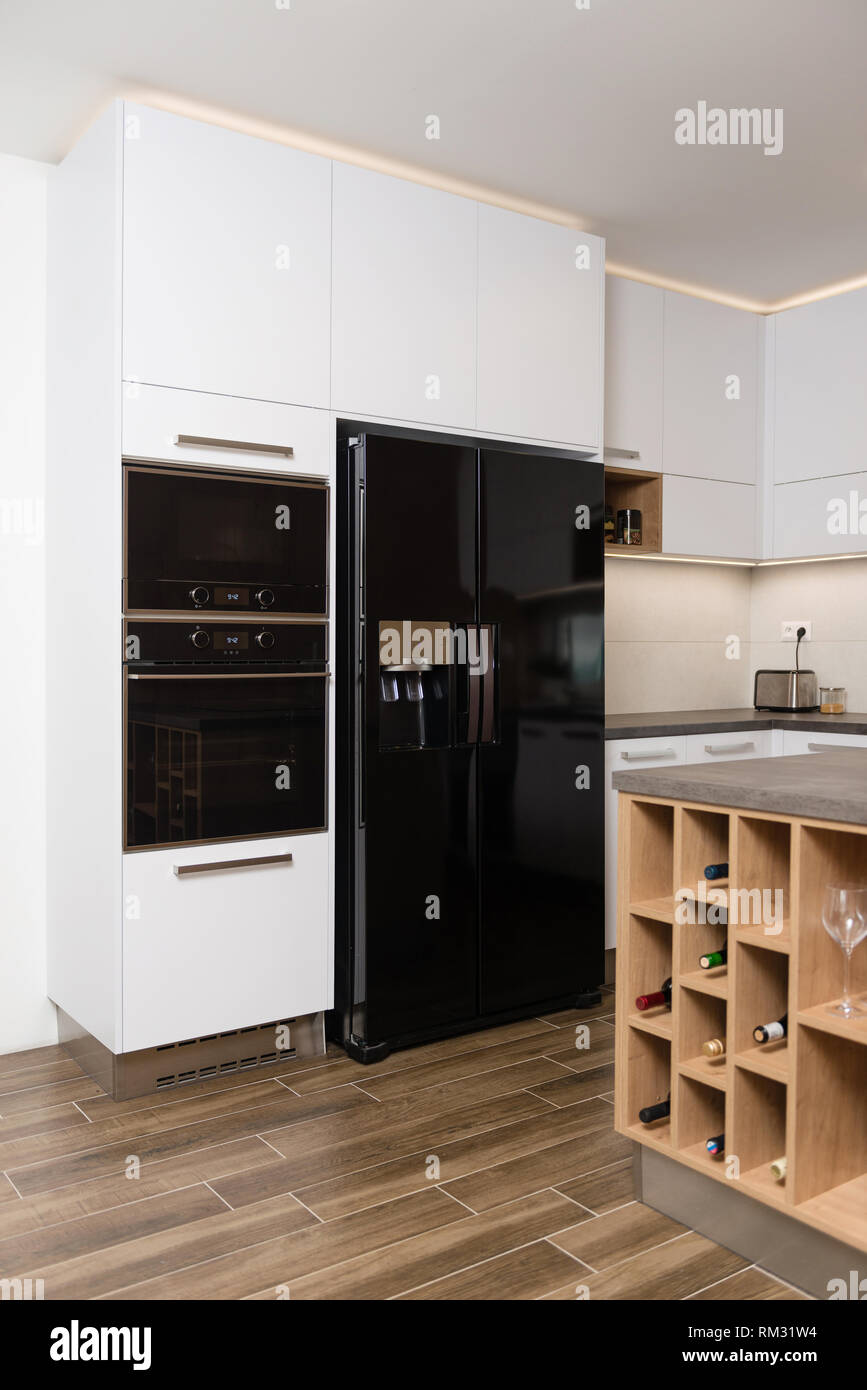 Interior of modern kitchen with built-in appliances Stock Photo - Alamy