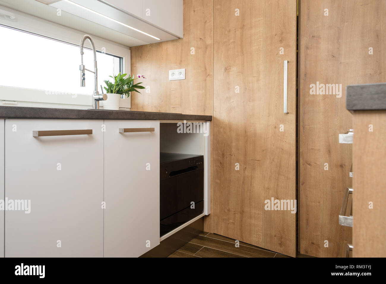 Interior of modern kitchen with built-in appliances Stock Photo - Alamy