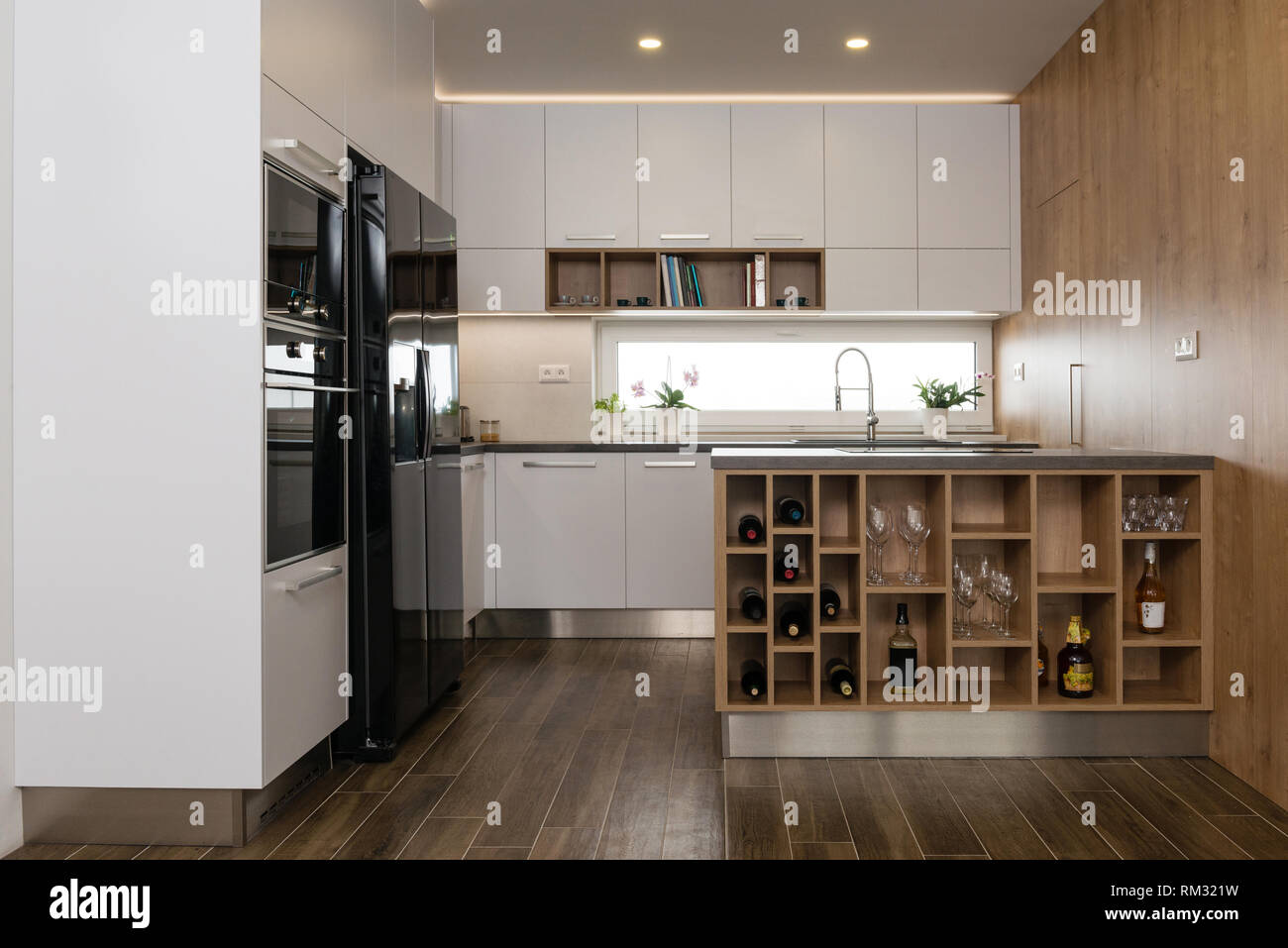 Interior of modern kitchen with built-in appliances Stock Photo - Alamy