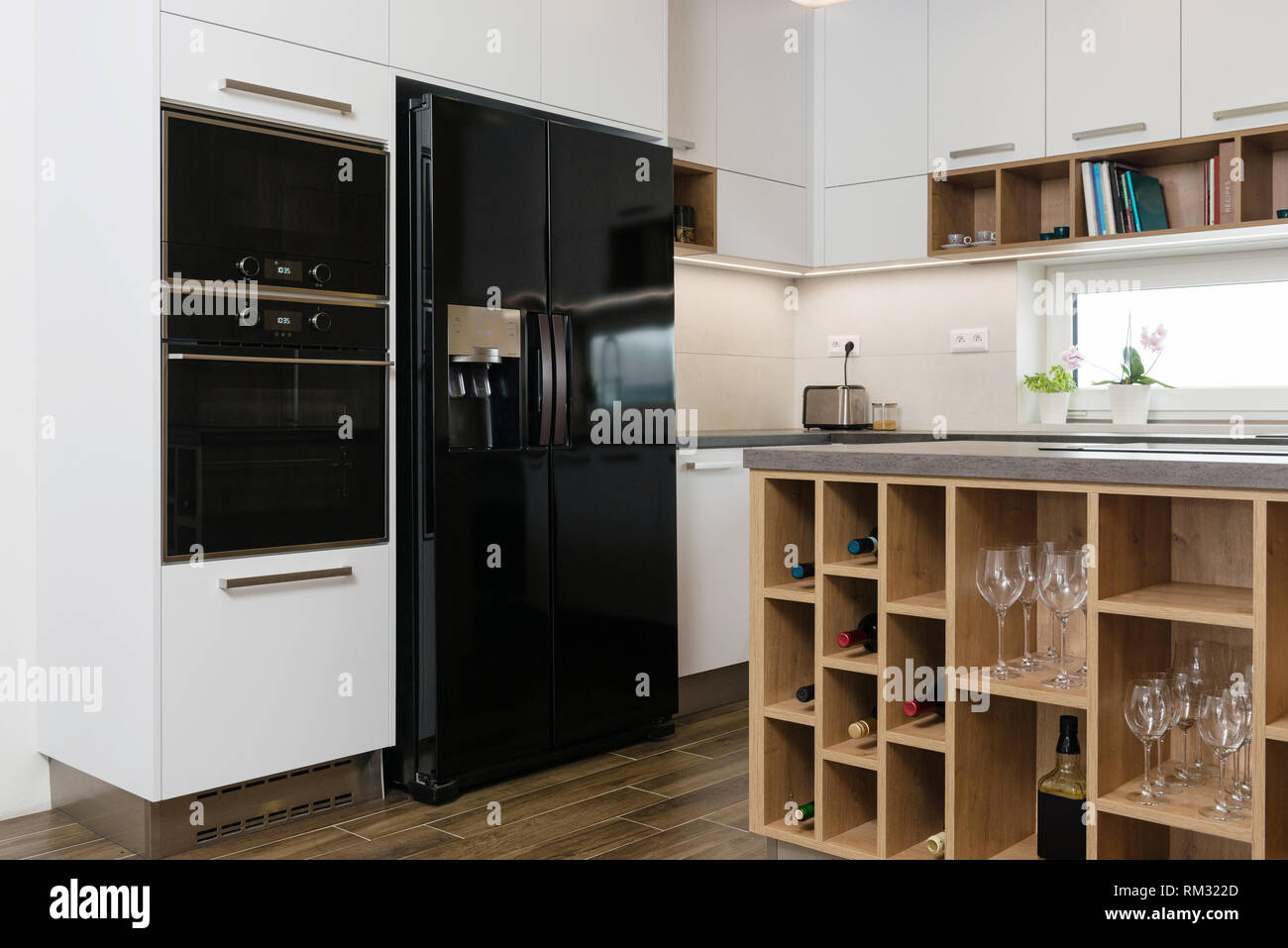 Interior of modern kitchen with built-in appliances Stock Photo - Alamy
