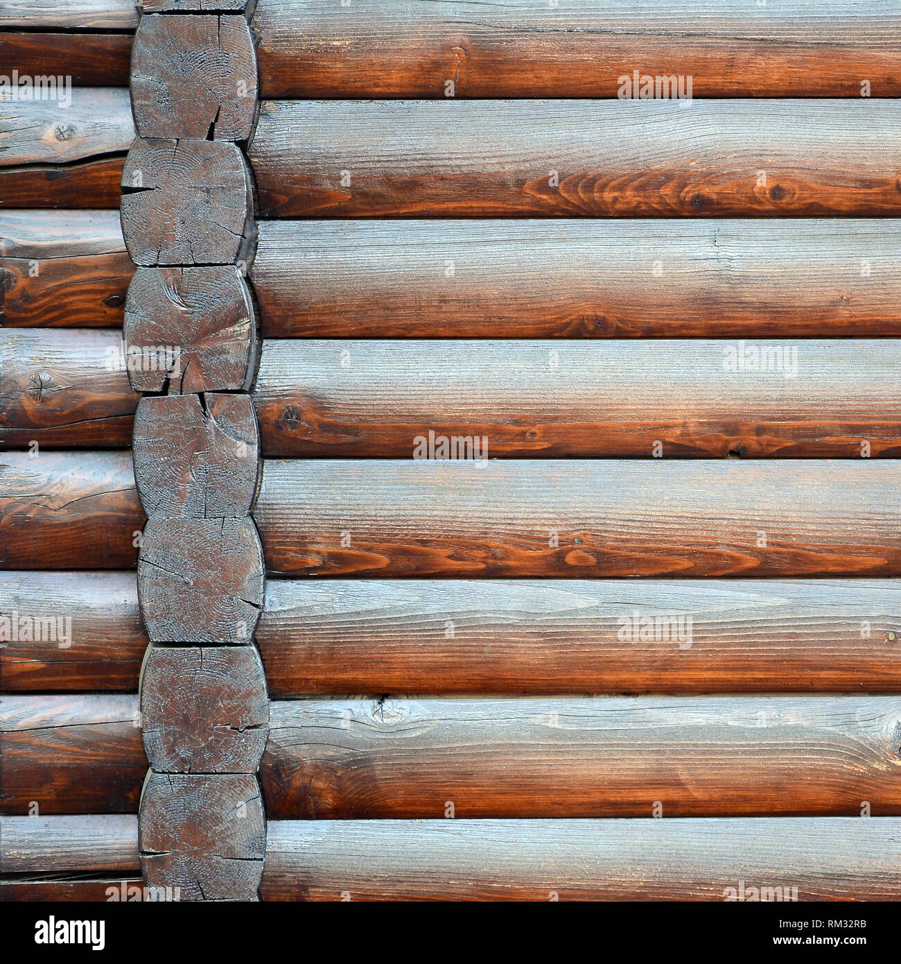Hewn timber. Rustic log wall horizontal timber background. Fragment of