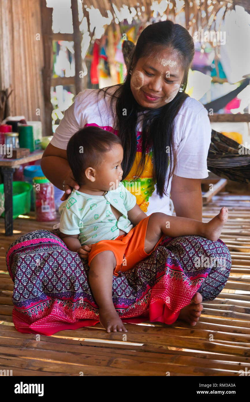 A mother and daughter in the MOKEN VILLAGE on KO SURIN THAI ISLAND in MU KO SURIN NATIONAL PARK - THAILAND Stock Photo