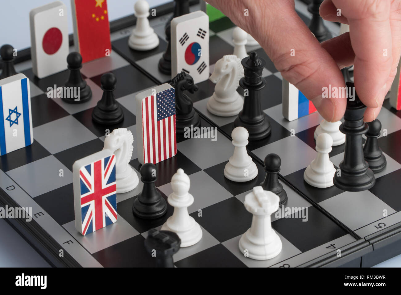 Politician S Hand Moves A Chess Piece Conceptual Photo Of A Political Game And Strategy Stock Photo Alamy