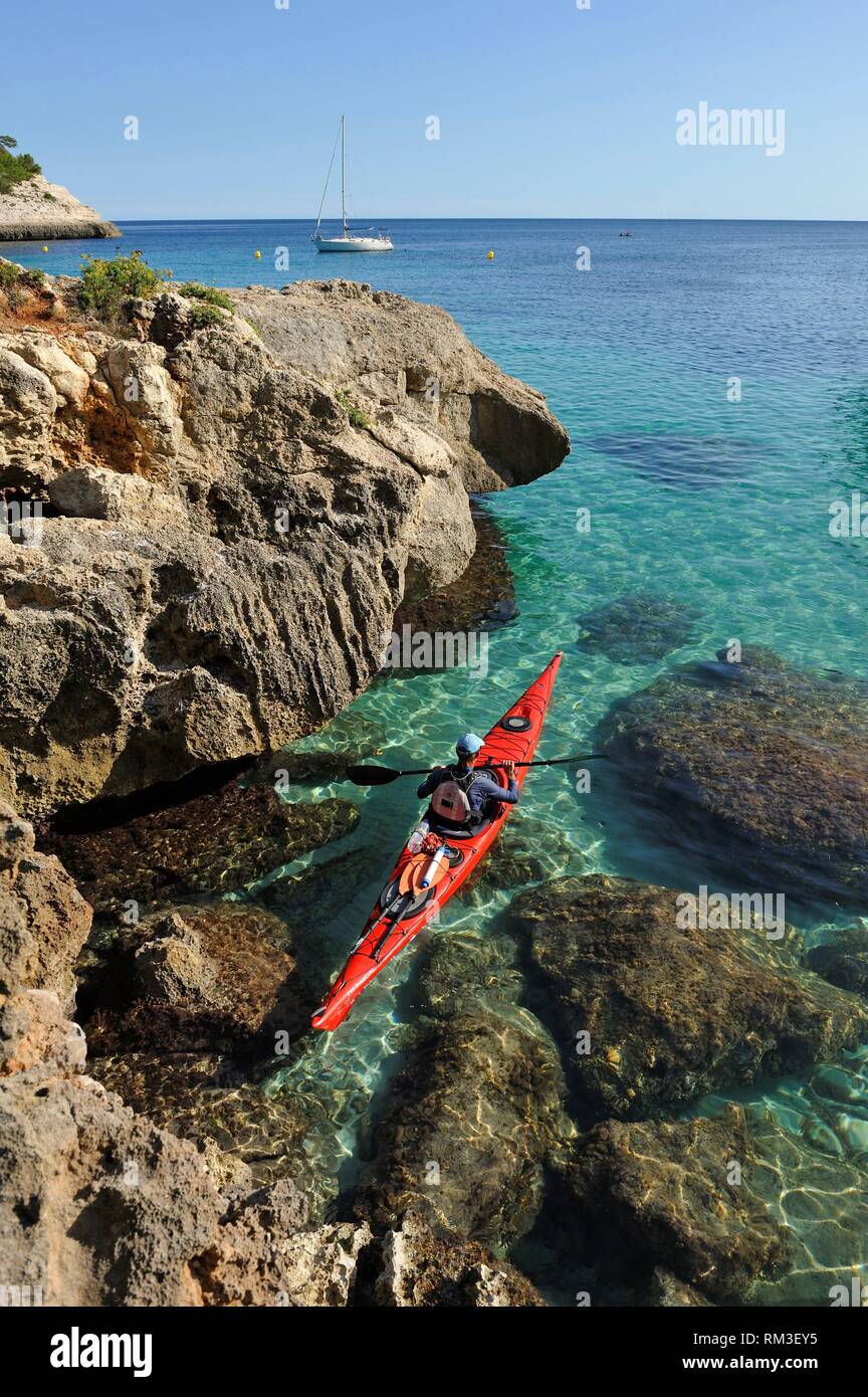 kayak in Mitjana creek near Cala Galdana, South Coast of Menorca, Balearic Islands, Spain, Europe. Stock Photo