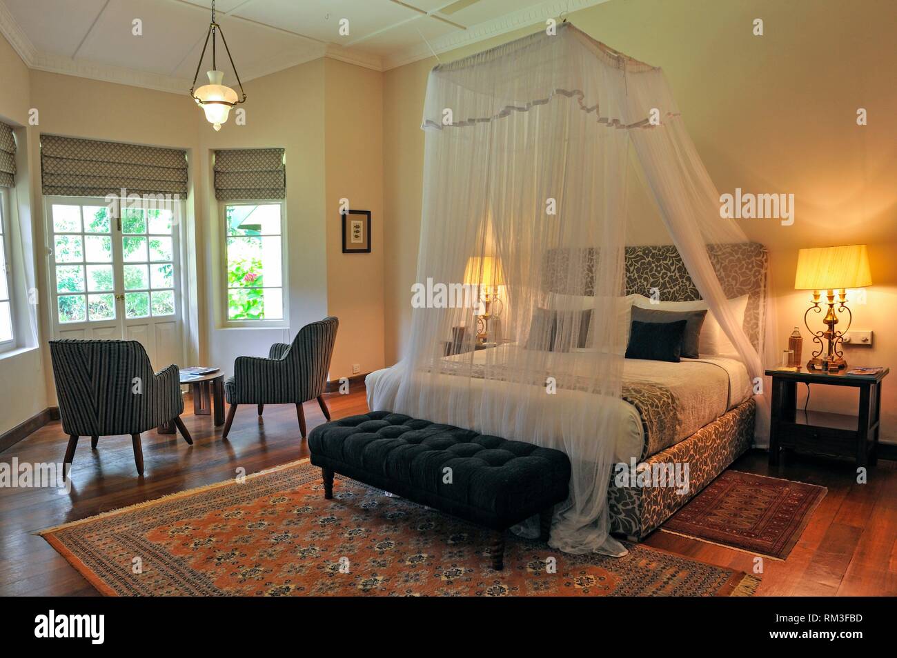 bedroom of the Summerville Bungalow of the luxury Ceylon Tea Trails resort, Sri Lanka, Indian subcontinent, South Asia. Stock Photo