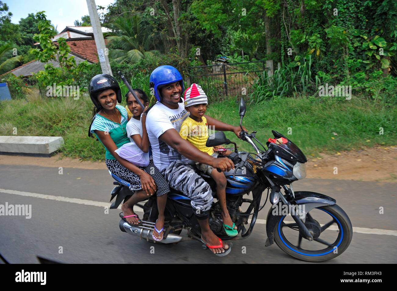 family riding a motorcycle, Sri Lanka, Indian subcontinent, South Asia  Stock Photo - Alamy