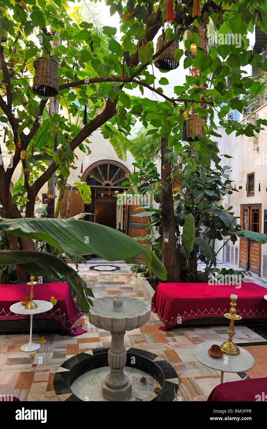one of the two courtyards of El-Fenn hotel, Marrakesh, Morocco, North Africa. Stock Photo
