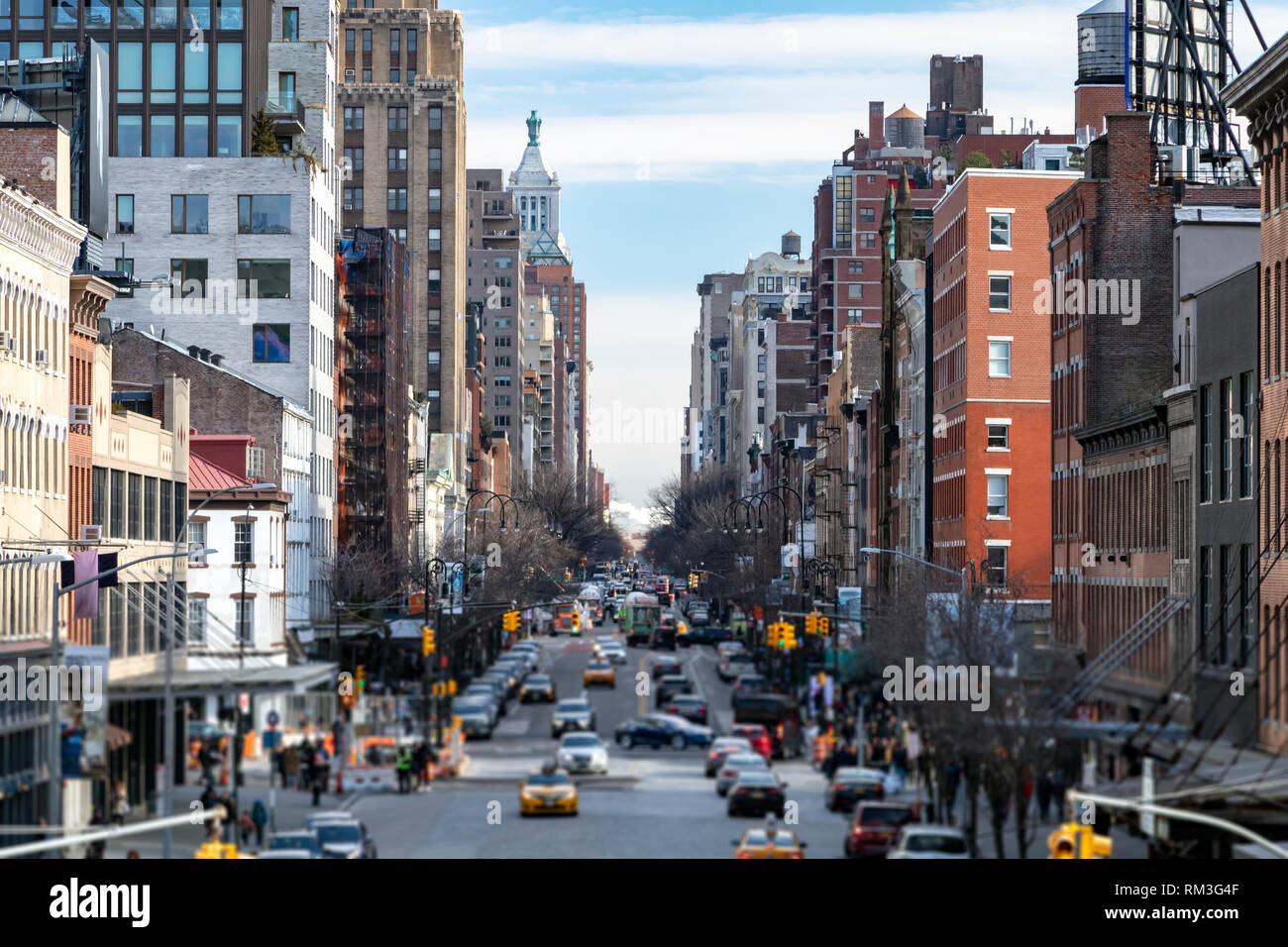 View of a busy 14th Street in the Chelsea neighborhood with people and ...