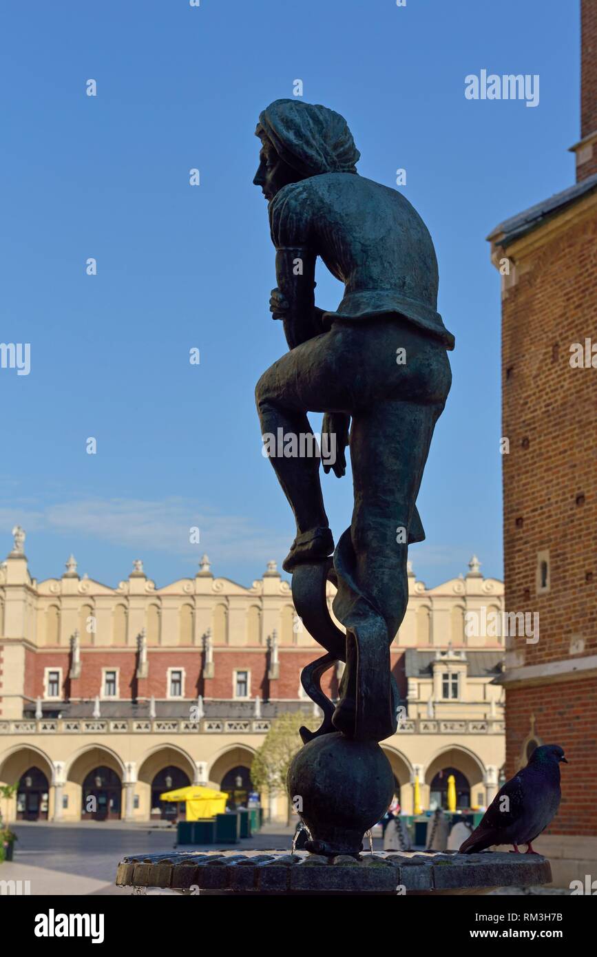 bronze statue, copy of a figure in the altarpiece by Veit Stoss, fountain on the Mariacki square beside St. Mary´s Basilica, Krakow, Malopolska Stock Photo