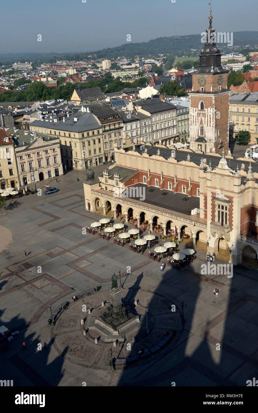 Adam Mickiewicz Monument, the Cloth Hall (Sukiennice) and Town Hall Tower seen from the highest tower of the St. Mary´s Basilica, Rynek Glowny, the Stock Photo