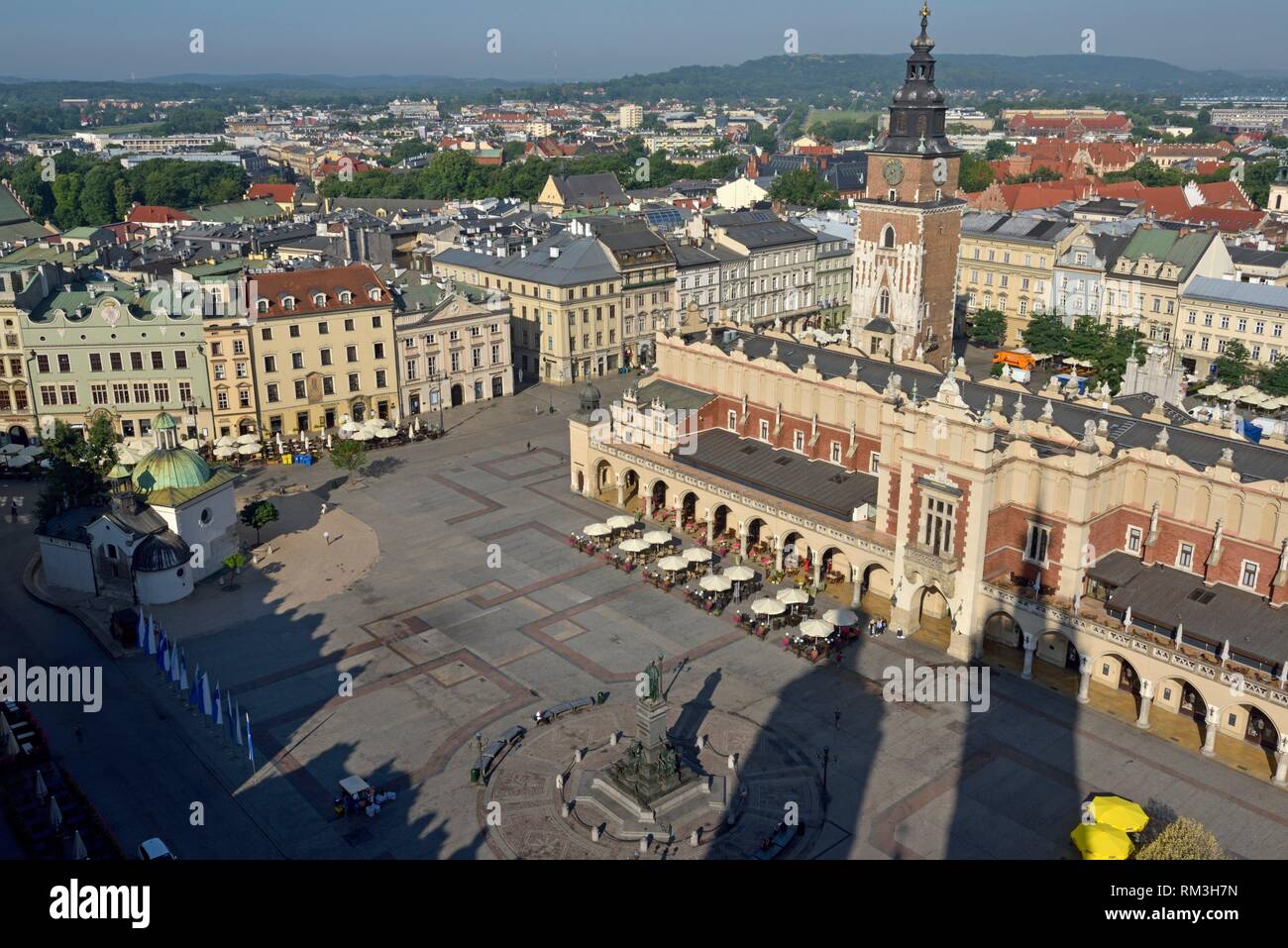 Adam Mickiewicz Monument, the Cloth Hall (Sukiennice) and Town Hall Tower seen from the highest tower of the St. Mary´s Basilica, Rynek Glowny, the Stock Photo