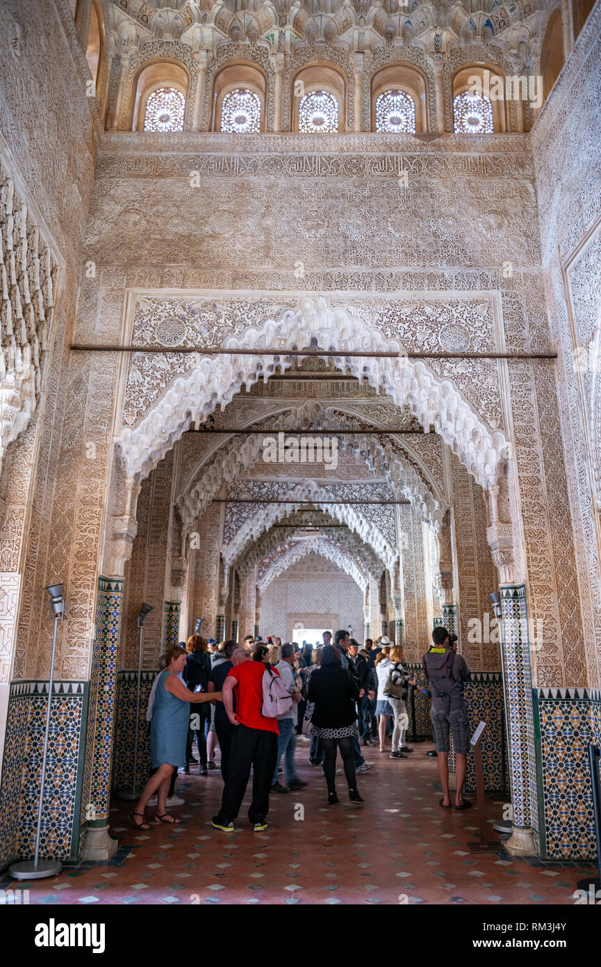 Tourists in the Sala de los Reyes or Hall of the Kings at the Alhambra