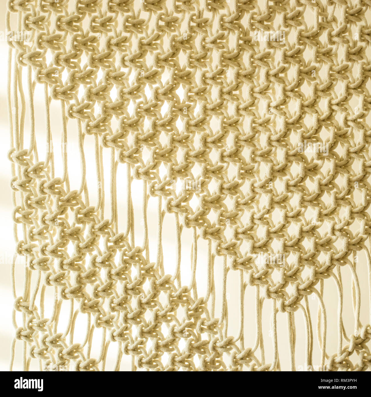 Weaving macrame modern needlework in the style of minimalism Stock