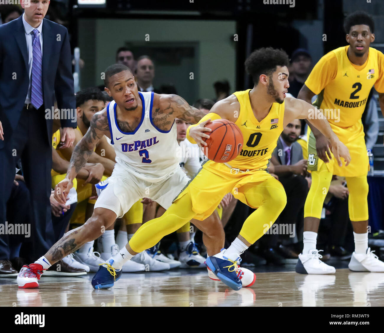 Chicago, USA. 12th Feb 2019. Marquette Golden Eagles guard Markus Howard (0) makes a quick move on DePaul Blue Demons guard Devin Gage (3) during NCAA basketball game between the Marquette Golden Eagles and the DePaul University Blue Demons at Wintrust Arena in Chicago IL. Gary E. Duncan Sr/CSM Credit: Cal Sport Media/Alamy Live News Stock Photo
