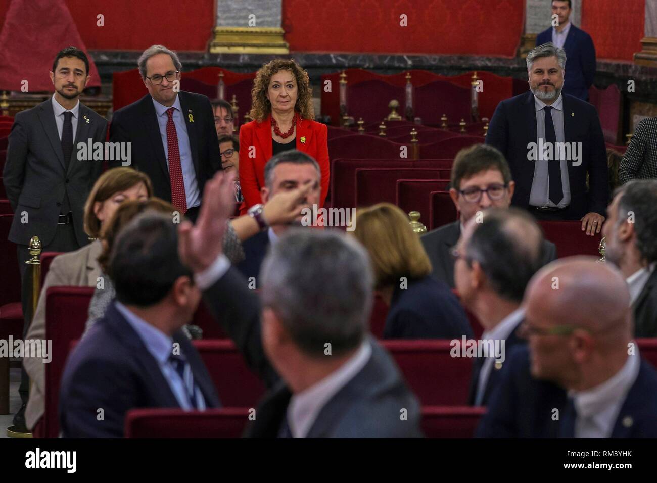 GRAF5792 MADRID, 12/02/2019.- El presidente de la Generalitat Quim Torra (2i, detrás), acompañado por el consejero de Territorio, Damiá Calvet (i) y la consejera de Justicia, Ester Capella (d), saluda a los líderes independentistas acusados por el proceso soberanista catalán que derivó en la celebración del 1-O y la declaración unilateral de independencia de Cataluña (DUI), durante la primera jornada del juicio del 'procés' celebrada este martes en el Tribunal Supremo. EFE/Emilio Naranjo ***POOL***  'Proces ' trial against Catalan separatist leaders in Supreme Court in Madrid, Spain, February  Stock Photo