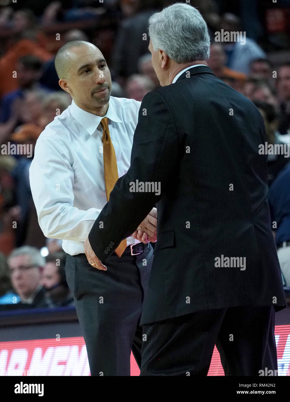 Feb 12, 2019. Head coach Bruce Weber of the Kansas State Wildcats shakes ShakaSmarts hand after the game vs the Texas Longhorns at the Frank Erwin Center in Austin Texas.Robert Backman/Cal Sport Media. Stock Photo