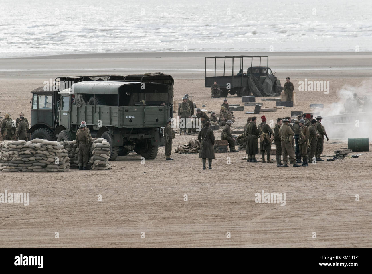 World War II, Second World War, WWII, WW2 BBC war world two drama called World On Fire. Hundreds of production staff, actors and soldiers, & military vehicles have moved onto the coastal sands of St Anne’s on Sea to capture wartime beach scenes of the epic story of the British Army Dunkirk Evacuation. World On Fire is described as 'an adrenalised, an emotionally gripping and resonant gritty drama following the first year of the Second World War. 1940s era, forties war weekend, wartime reenactment, UK Stock Photo