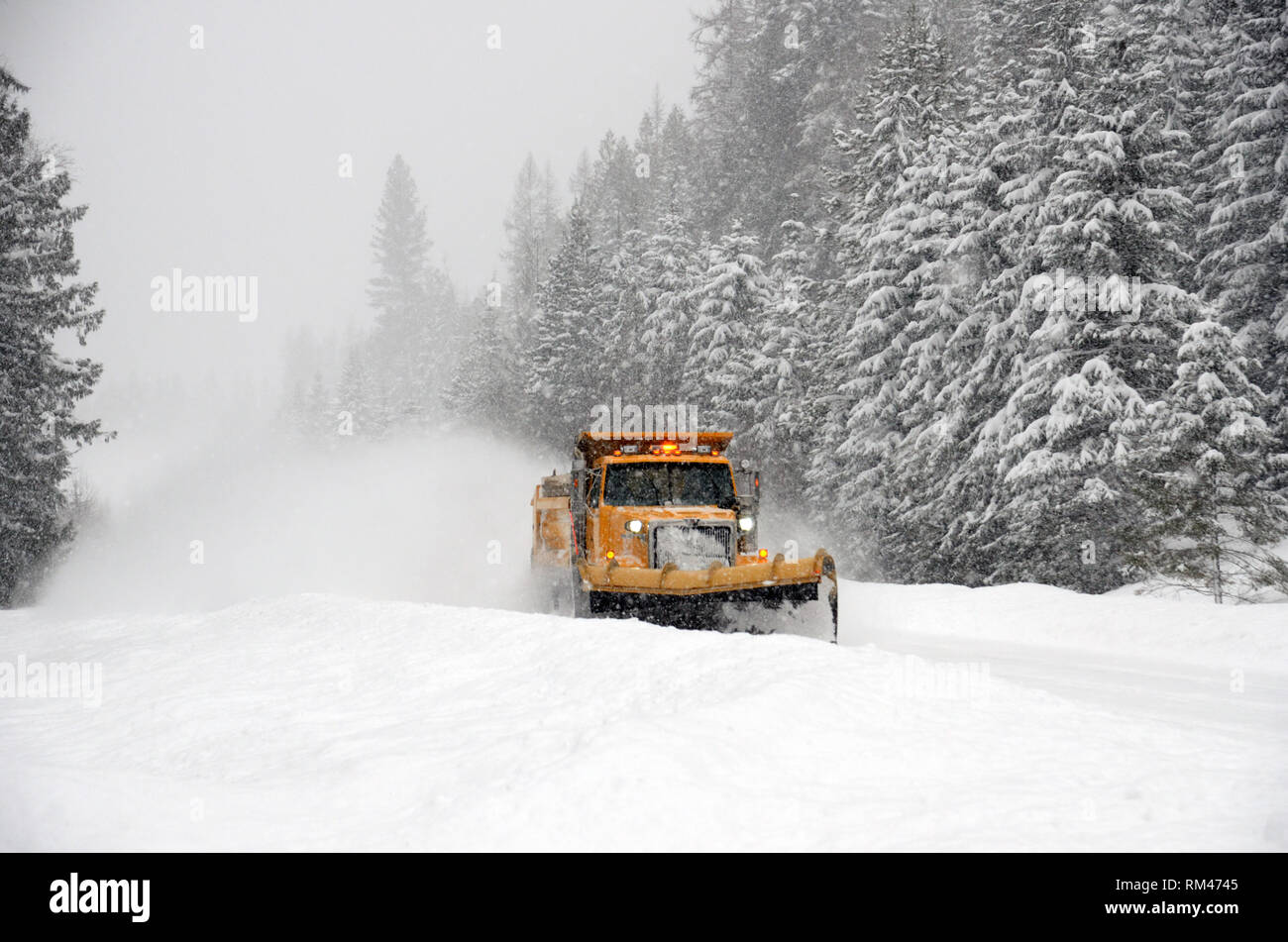 Lincoln County snow truck plowing snow on Montana state highway ...