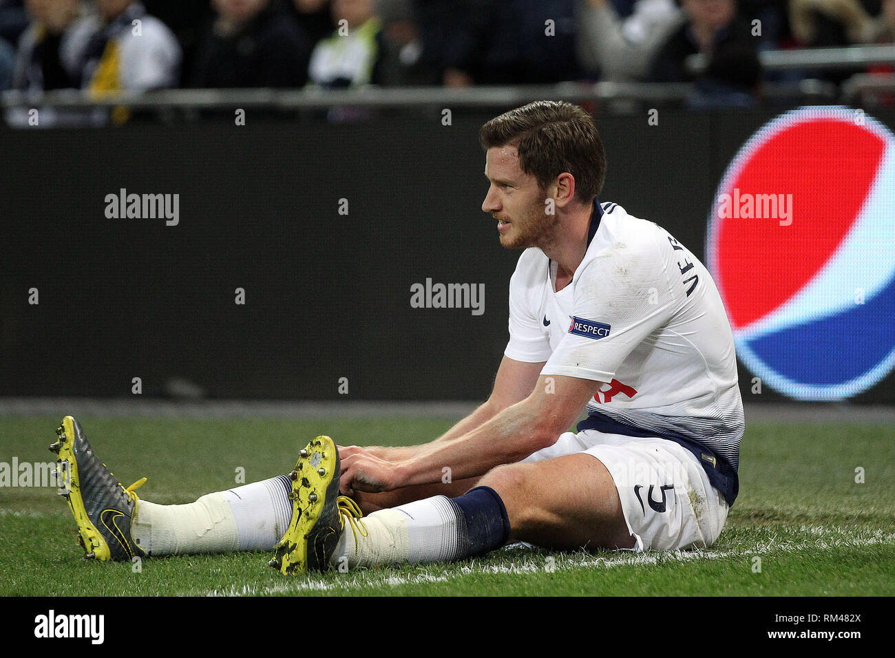 Jan Vertonghen of Tottenham Hotspur lays on the turf after being tackled by Achraf Hakimi of Borussia Dortmund. UEFA Champions league match, round of 16, 1st leg match, Tottenham Hotspur v Borussia Dortmund at Wembley Stadium in London on Wednesday 13th February 2019. this image may only be used for Editorial purposes. Editorial use only, license required for commercial use. No use in betting, games or a single club/league/player publications . pic by Steffan Bowen/Andrew Orchard sports photography/Alamy Live news Stock Photo