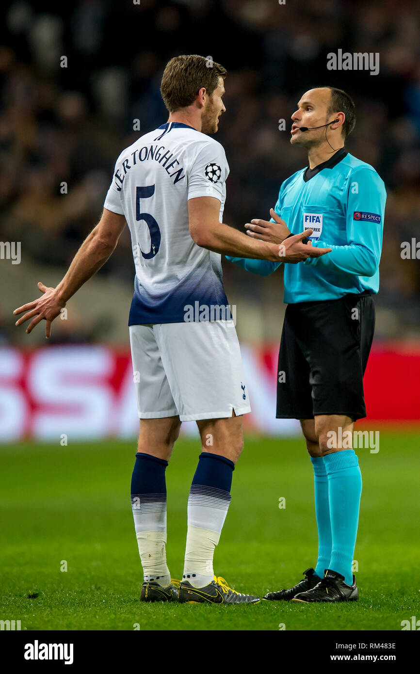 London, UK. 13th Feb, 2019. Jan Vertonghen of Tottenham Hotspur talks with match referee Mateu Lahoz (ESP) during the UEFA Champions League round of 16 match between Tottenham Hotspur and Borussia Dortmund at Wembley Stadium, London, England on 13 February 2019. Photo by Salvio Calabrese. Editorial use only, license required for commercial use. No use in betting, games or a single club/league/player publications. Credit: UK Sports Pics Ltd/Alamy Live News Stock Photo
