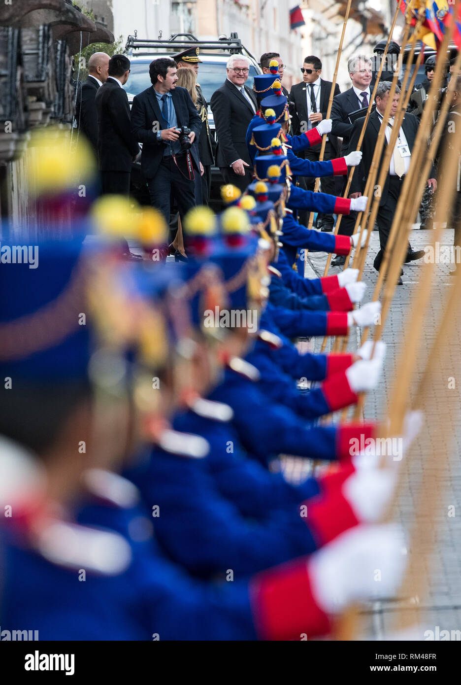 Quito, Ecuador. 13th Feb, 2019. Federal President Frank-Walter Steinmeier leaves the presidential palace, the Palacio de Carondelet, for the church La Compania de Jesus, where he is presented with the city key. Federal President Steinmeier and his wife are visiting Colombia and Ecuador on the occasion of Alexander von Humboldt's 250th birthday as part of a five-day trip to Latin America. Credit: Bernd von Jutrczenka/dpa/Alamy Live News Stock Photo