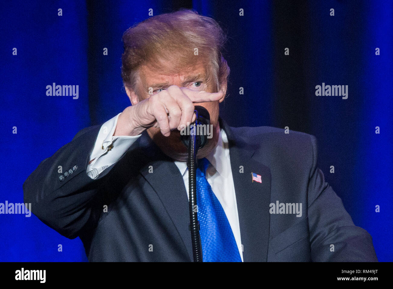 Washington DC, USA. 13th Feb 2019. US President Donald J. Trump gestures while delivering remarks at the Major County Sheriffs and Major Cities Chiefs Association Joint Conference, in Washington, DC, USA, 13 February 2019. Republican leaders are asking Trump to sign legislation that allocates about 1.375 billion USD (1.218 billion euros) for over fifty miles of physical barriers along the border. Credit: MediaPunch Inc/Alamy Live News Stock Photo