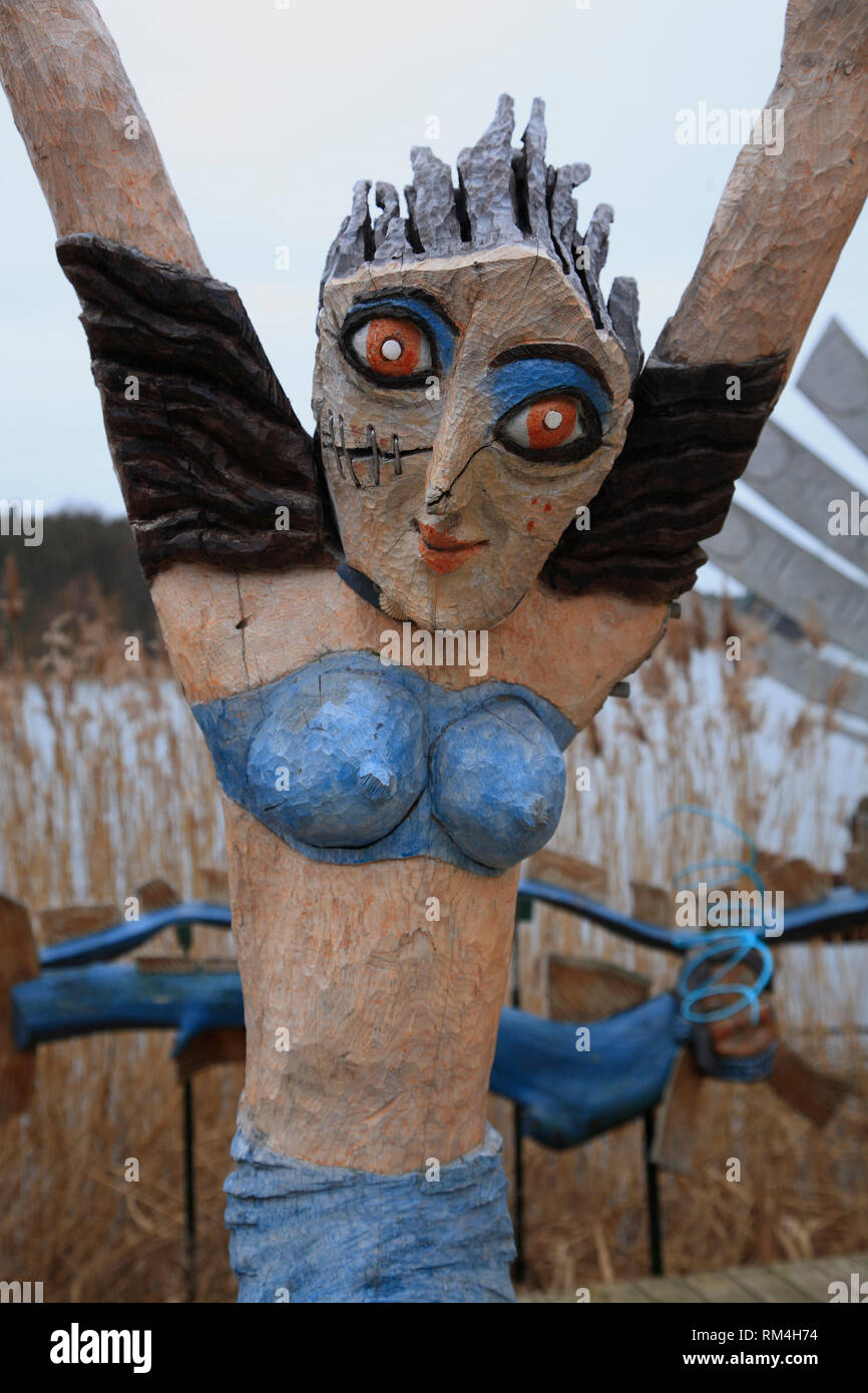 Wooden sculture by artist Tony Torrilhorn, Rheinsberg, Brandenburg, Germany, Europe Stock Photo