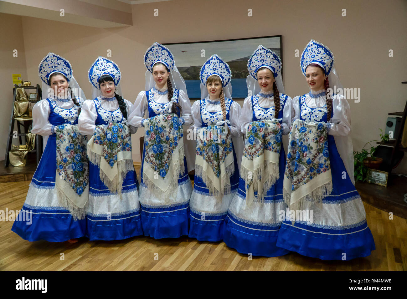 Russian women in traditional costumes in Barentsburg, a Russian coal mining settlement in Billefjorden, Spitsbergen, Norway Stock Photo