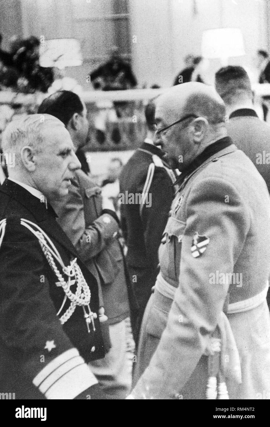 Chief of the Abwehr, the German military intelligence service Wilhelm Canaris (left) in discussion with Spanish General Jose Moscardo at a reception in Berlin, Germany, 1939 Stock Photo
