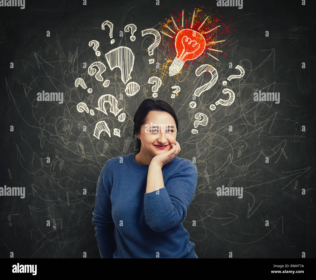 Young pensive woman hand under chin, interrogation marks, light bulbs and arrow mess above head. Question and idea concept. Find solution to problems. Stock Photo