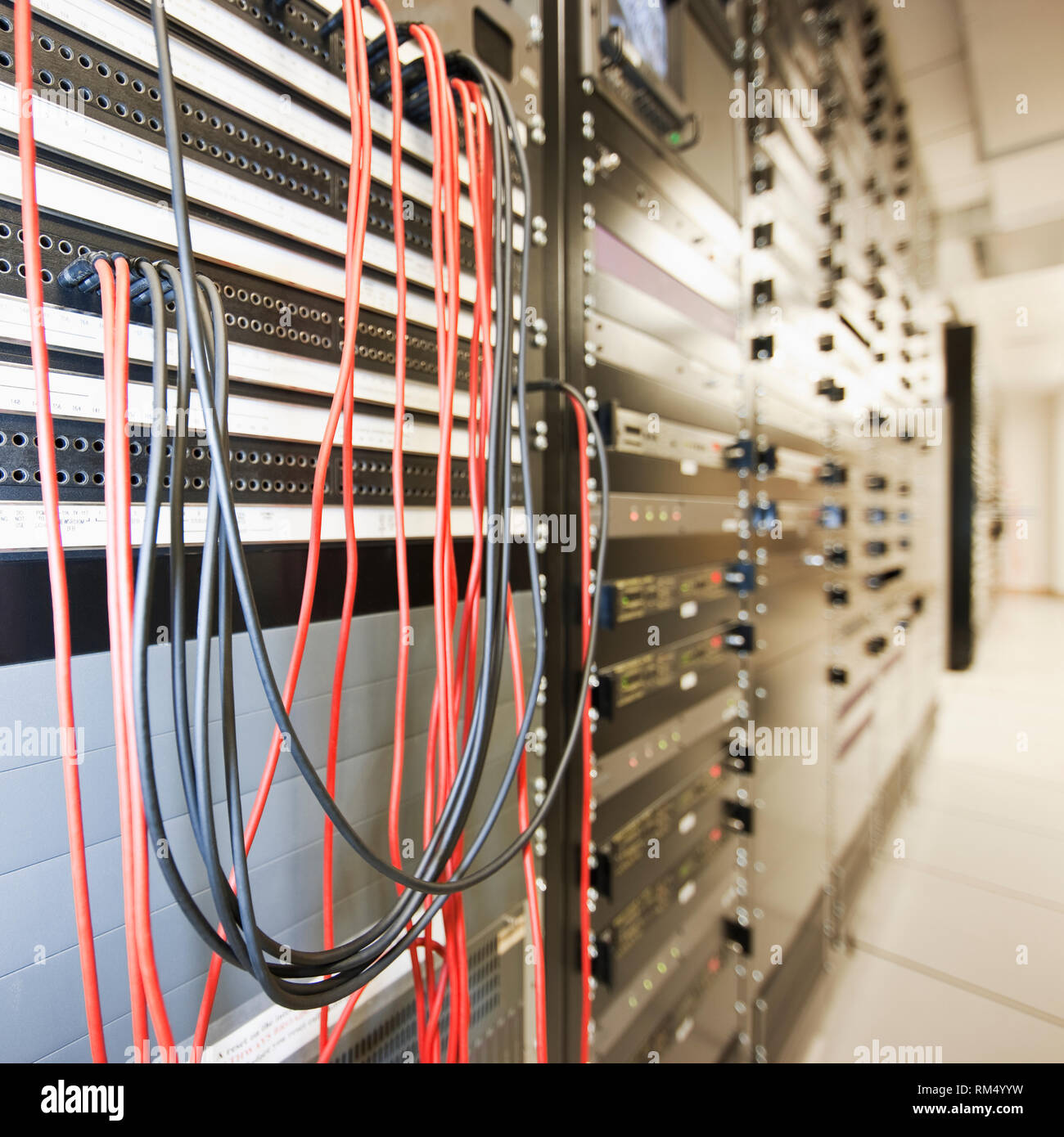 Close Up Of Computer Servers And Cords In Server Room A