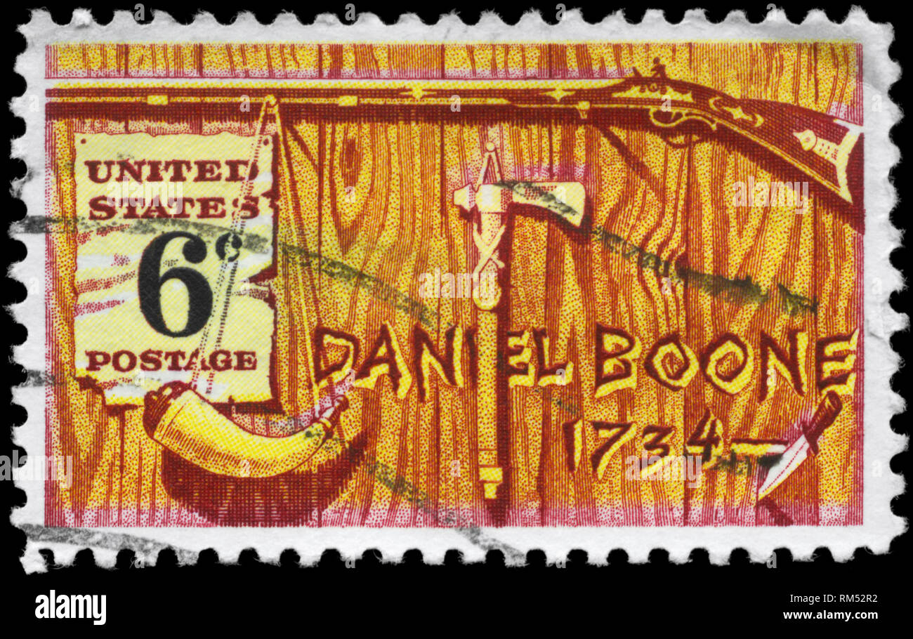 USA - CIRCA 1968: A Stamp printed in USA shows the Rifle, Powder Horn, Tomahawk Pipe & Knife, devoted to Daniel Boone (1734-1820), frontiersman and tr Stock Photo