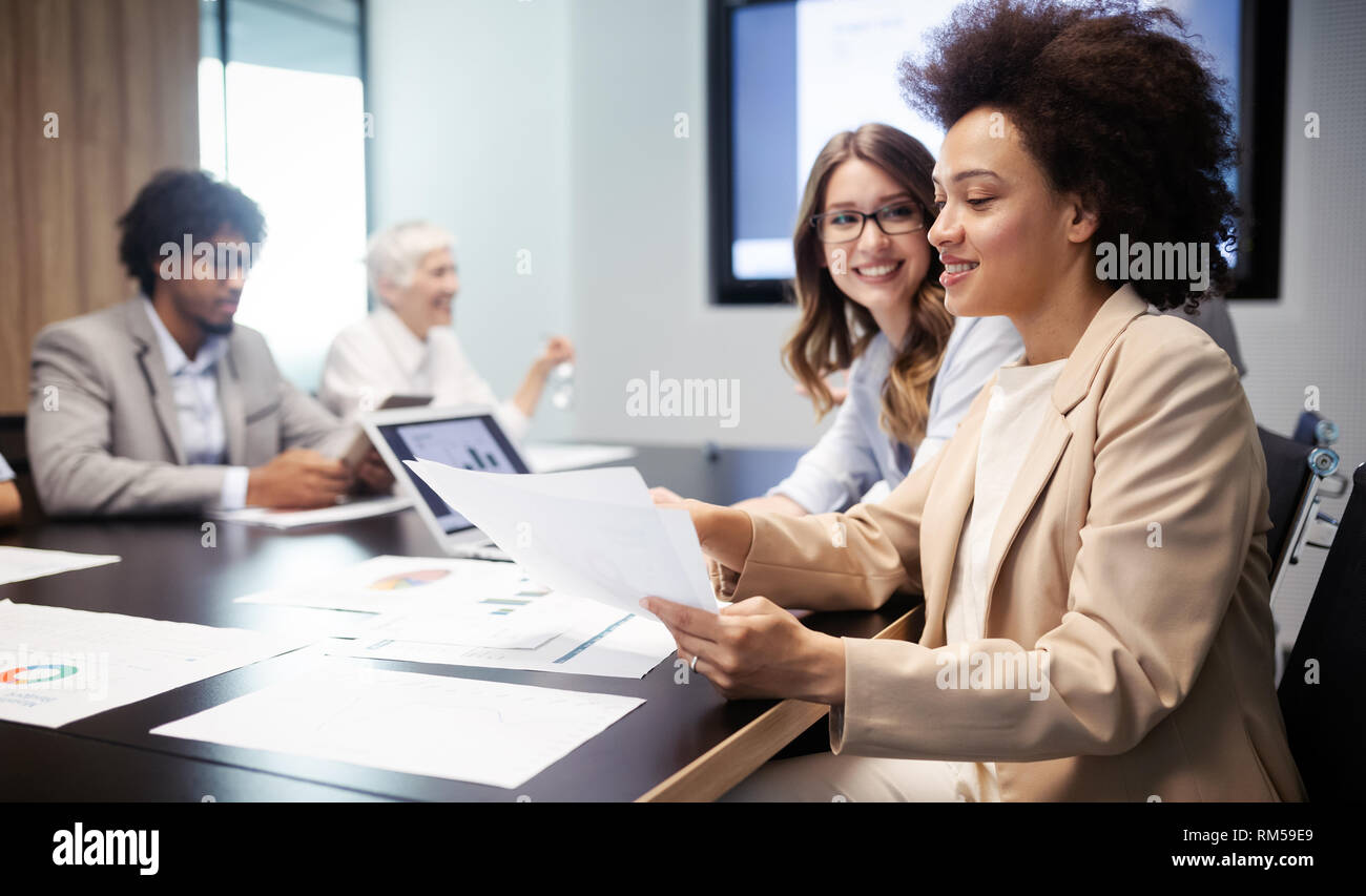 Group of successful business people at work in office Stock Photo - Alamy