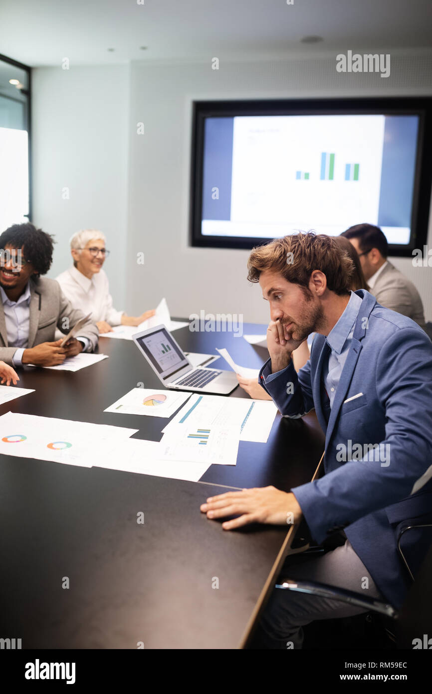 Group of successful business people at work in office Stock Photo - Alamy
