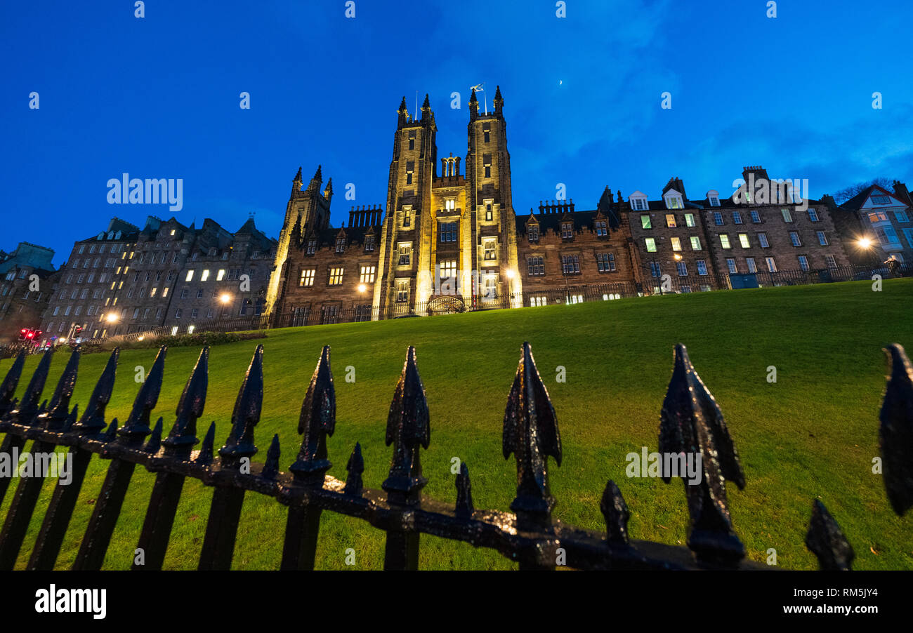 Night view of Edinburgh University New College building on The Mound in Edinburgh Old Town, Scotland, UK Stock Photo