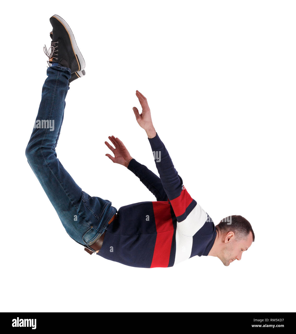 Side view of man in zero gravity or a fall. guy is flying, falling or ...