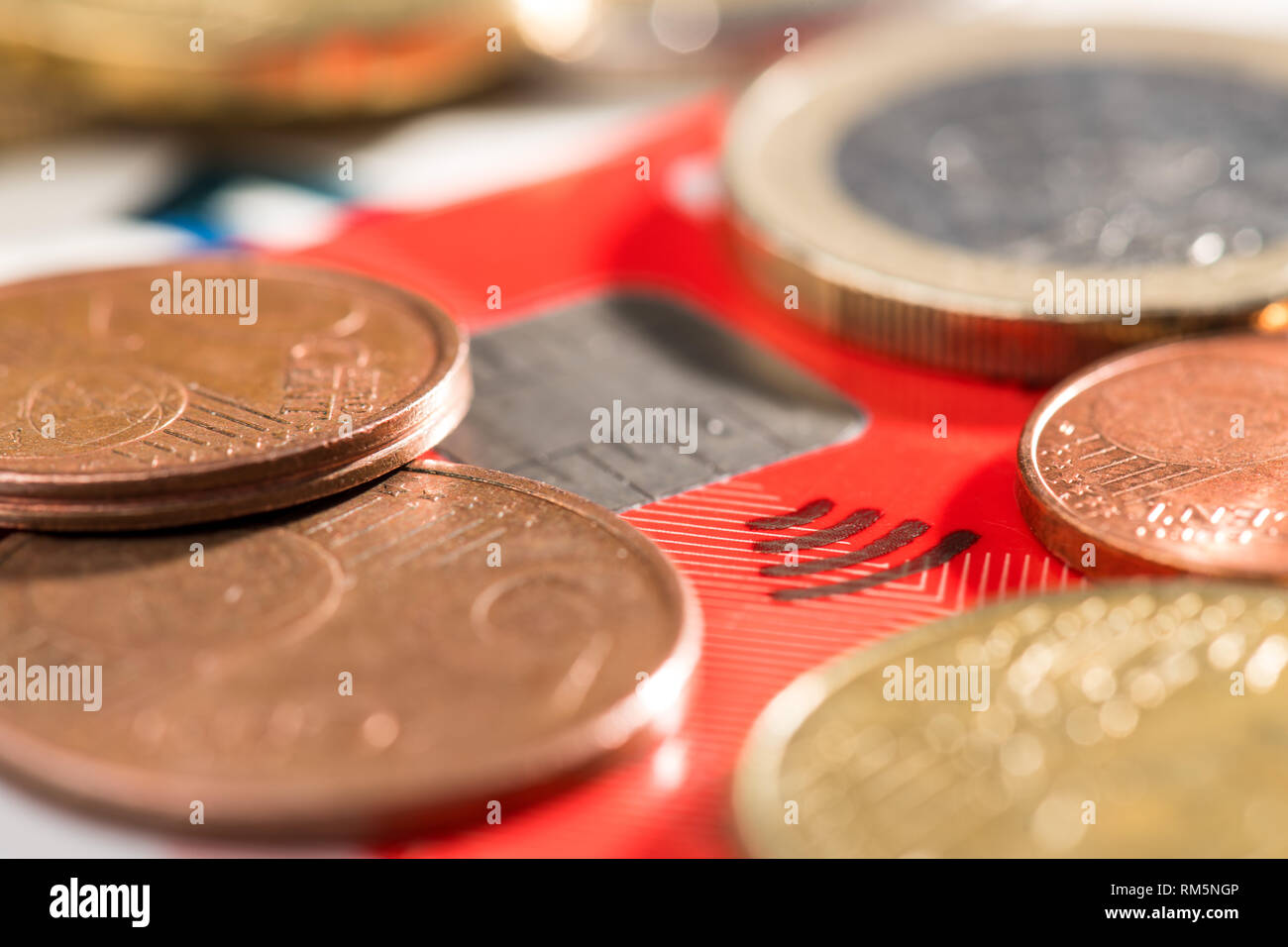 EC Card with Euro coins Stock Photo