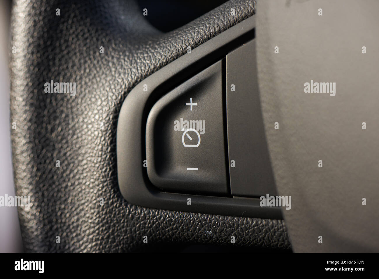 Cruise control buttons to set speed, add speed and subtract Stock Photo
