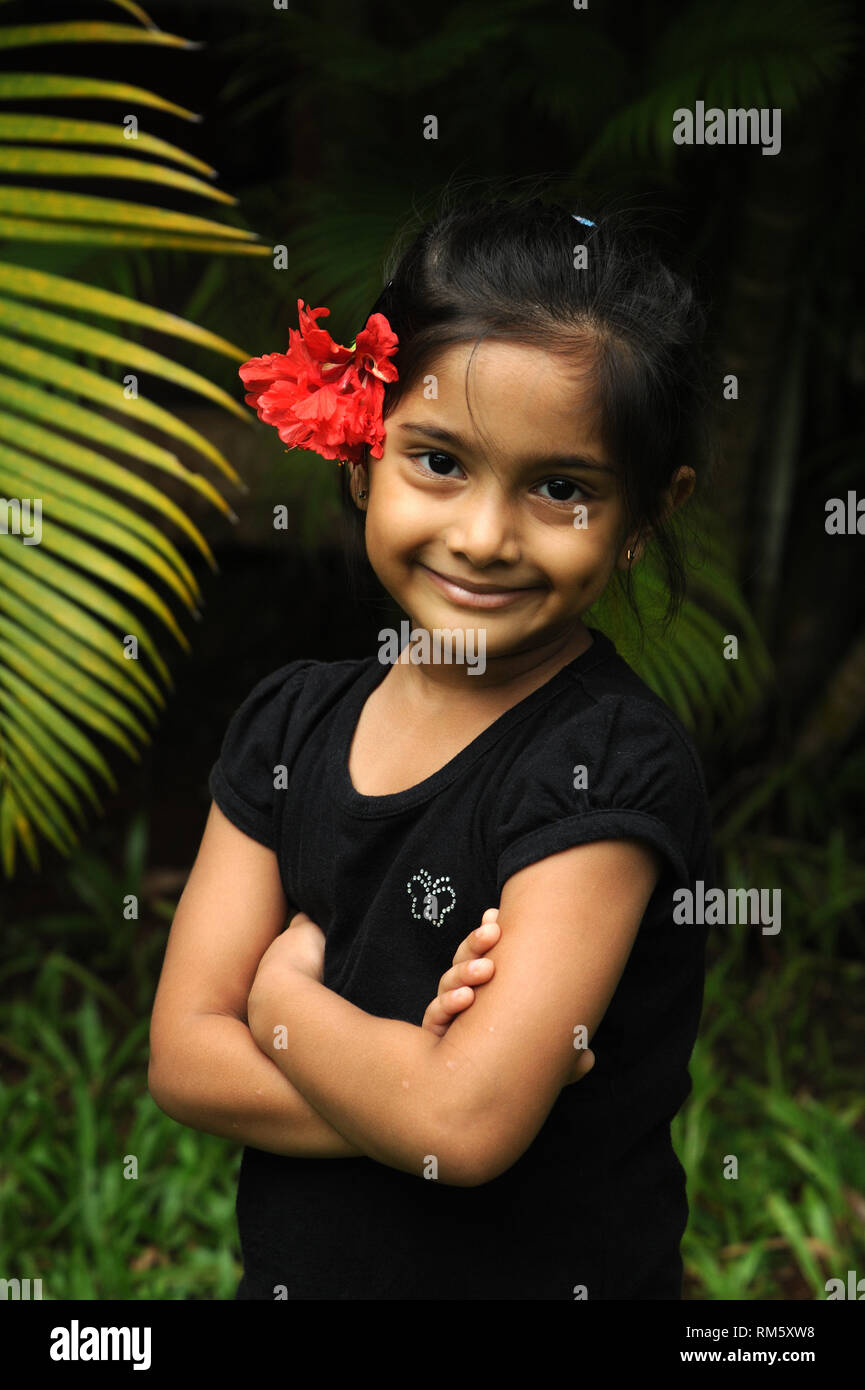 Little girl arms crossed Stock Photo
