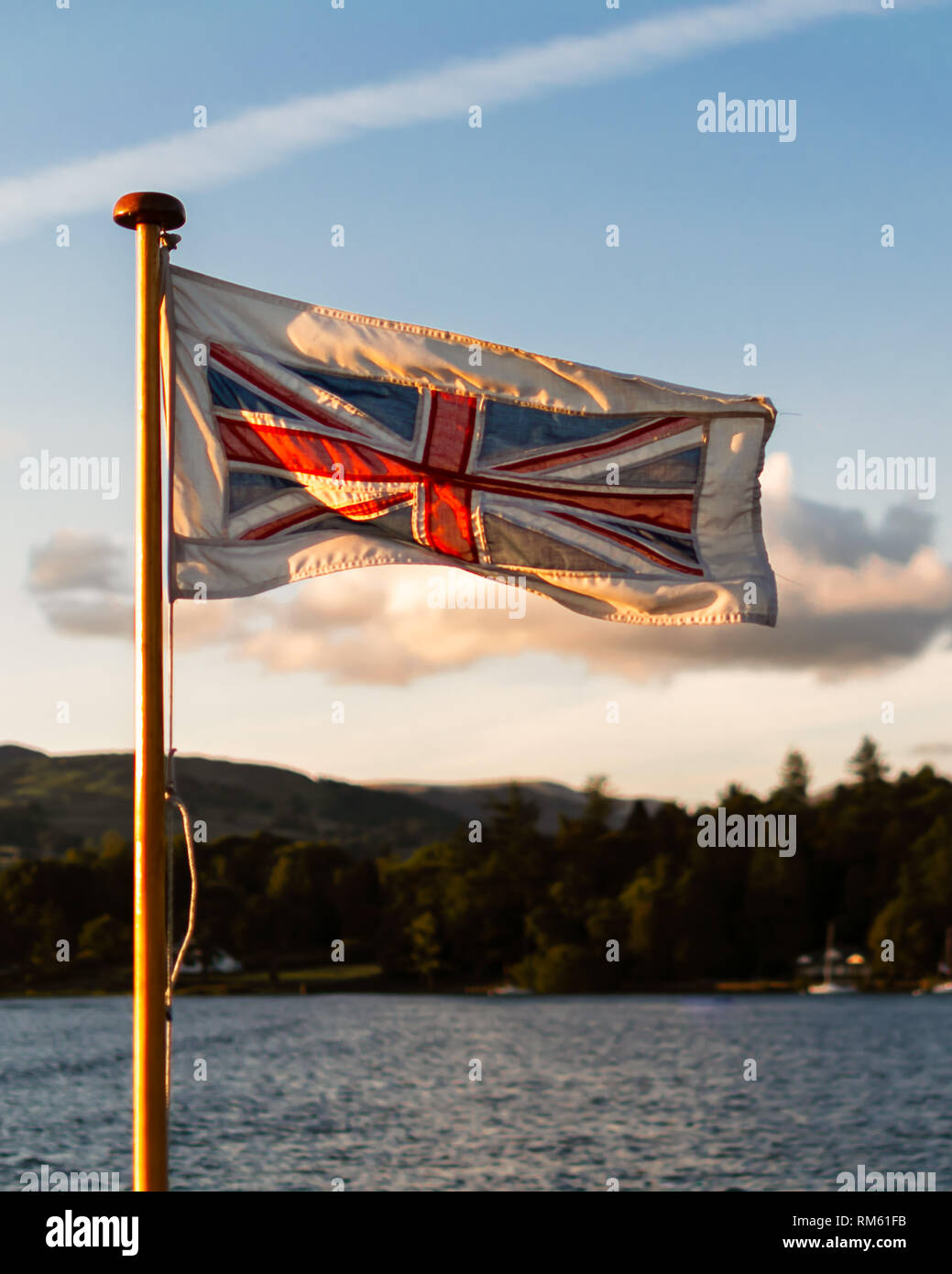 Boat with union jack flag of great britain hires stock photography and