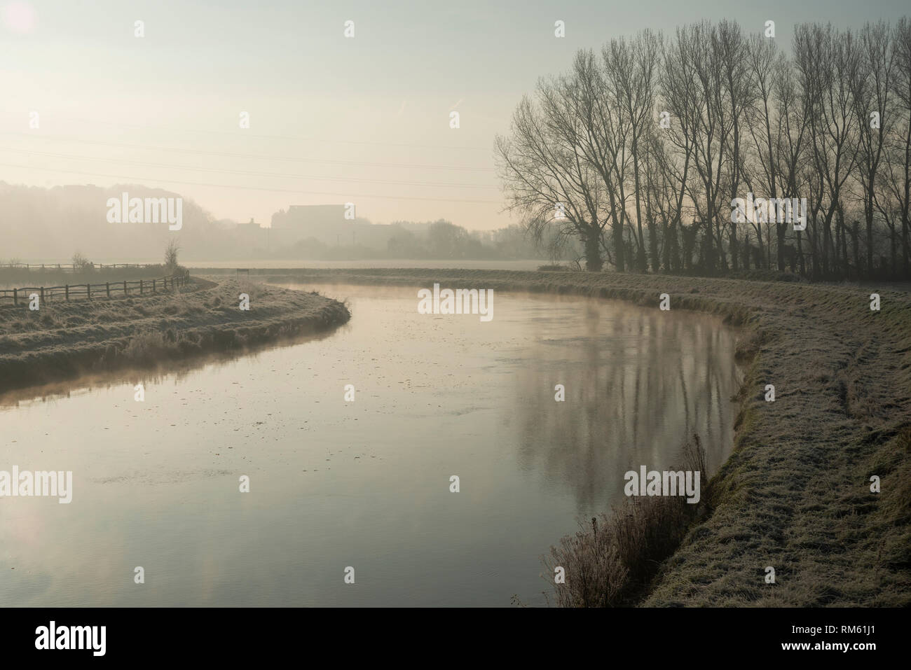 A cold, misty Winter morning on the River Adur near Bramber, West Sussex, UK Stock Photo